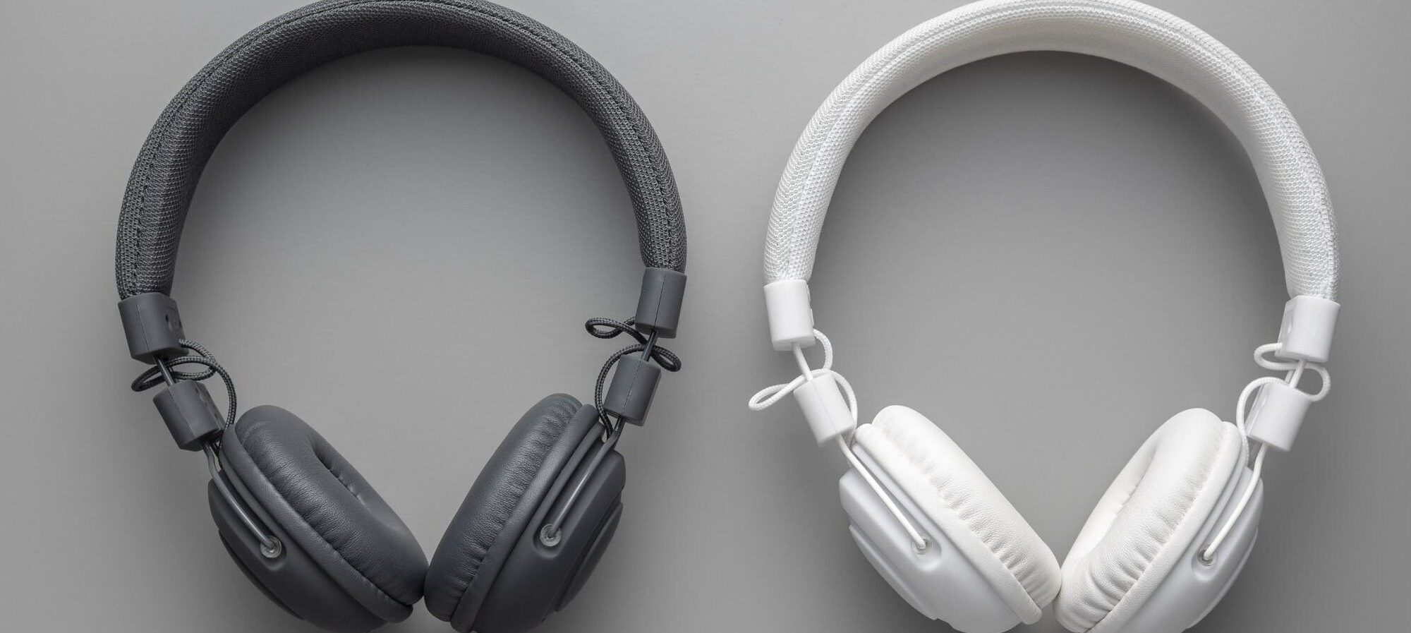 white and black wired stereo headphones on gray ba 2023 11 27 05 22 10 utc (2)