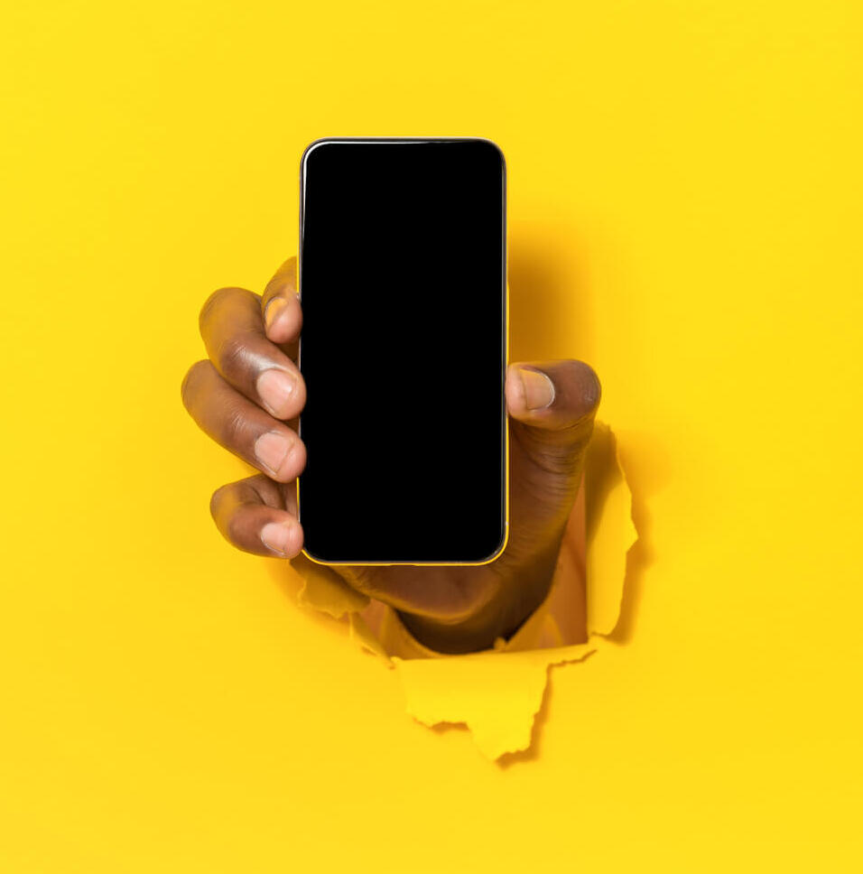 mobile app closeup of black male hand holding cel 2023 11 27 05 30 22 utc 1 1 1.jpg